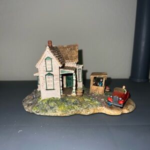 Charming Miniature House with Red Car